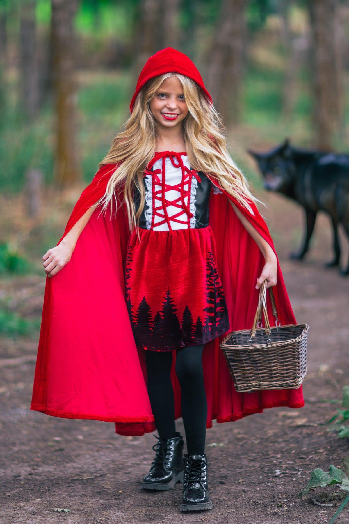 little red riding hood costume dress Captivating Miss - Red Riding Hood Black velvet panels with decorative embroidery and sequins are stitched in at the side seams and connected by a satin ribbon to mimic a laced corset Celebrating World Book Day in