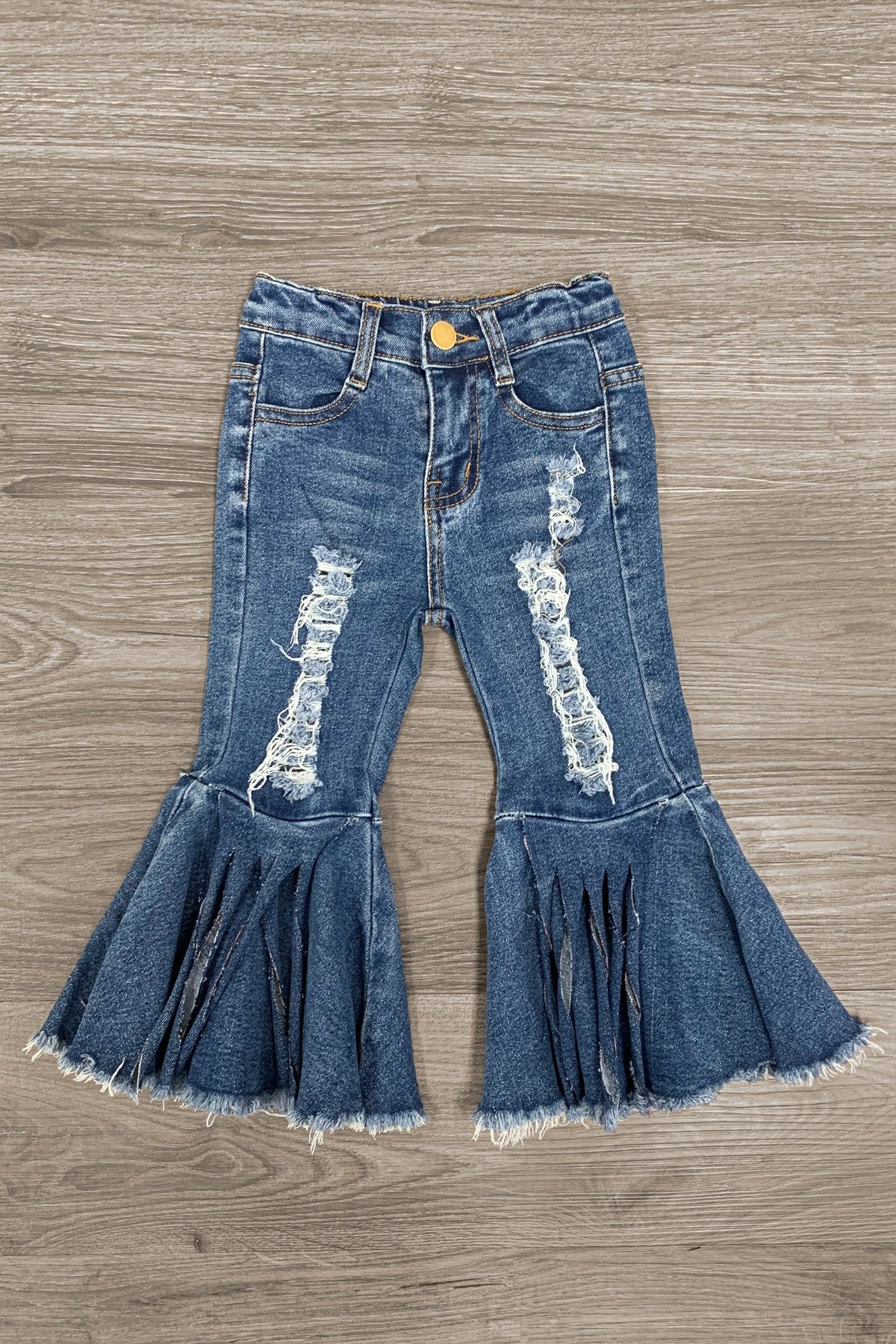 http://sparkleinpink.com/cdn/shop/products/distressed-denim-bell-bottom-jeans-bottom-sparkle-in-pink-102709.jpg?v=1707960823