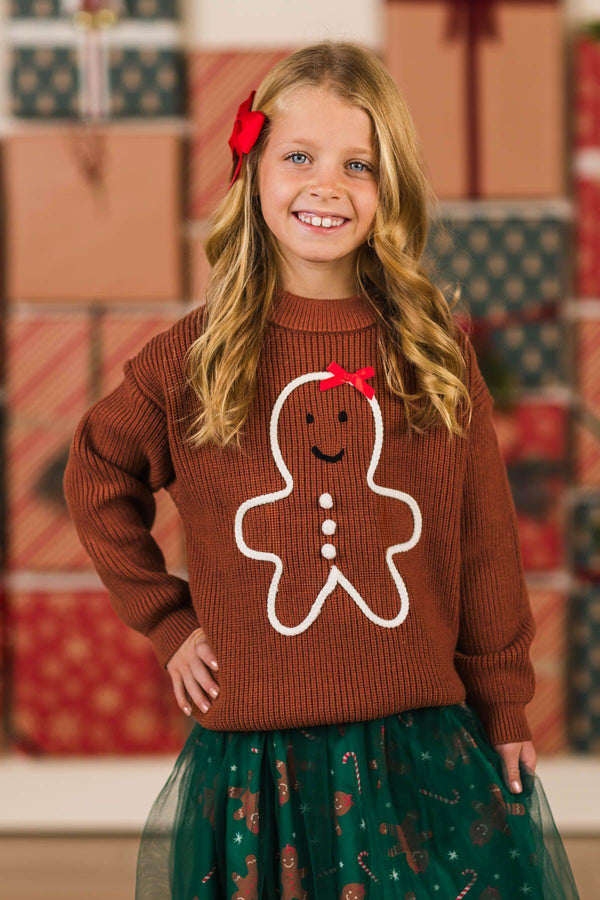 Green Gingerbread Tutu Skirt Set - 6-12 Months - Brown knit sweater with a gingerbread man graphic, paired with a green tulle tutu skirt decorated with gingerbread patterns.