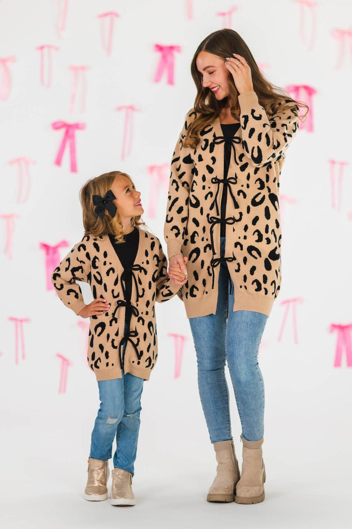 Mom & Me - Leopard Print Lace-Up Cardigan - CHILD-3XS-6-12 Months - Matching leopard print lace-up cardigans with black ribbon ties, worn with jeans and ankle boots by mother and daughter.