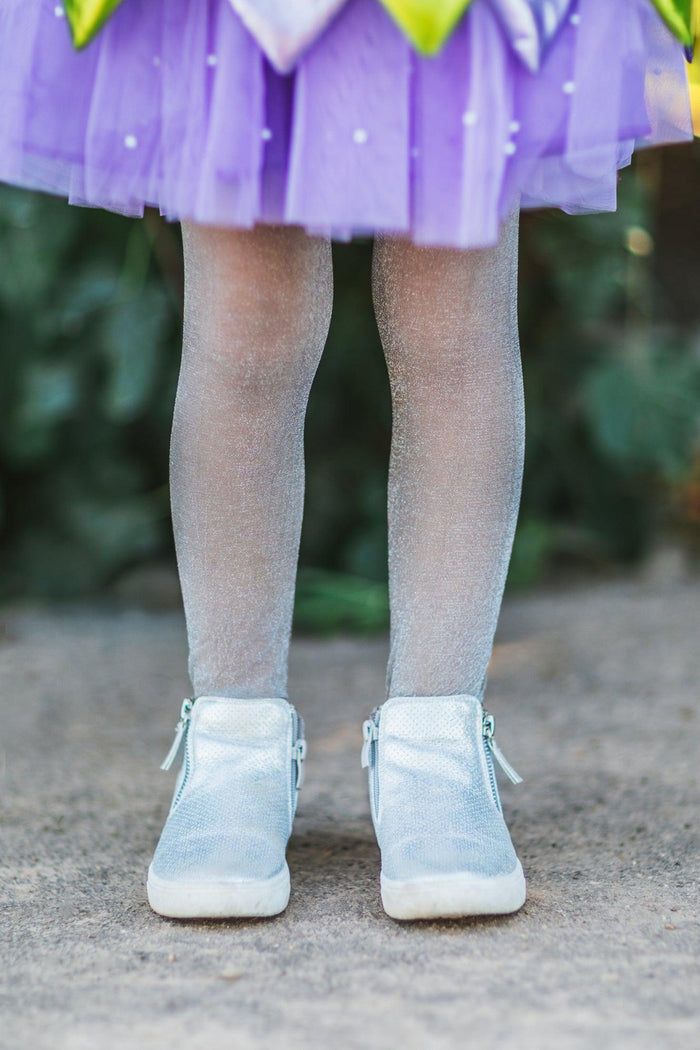 Silver Glitter Tights - Small-1-5 years - Child wearing silver glitter tights and white ankle boots under a purple tulle skirt.