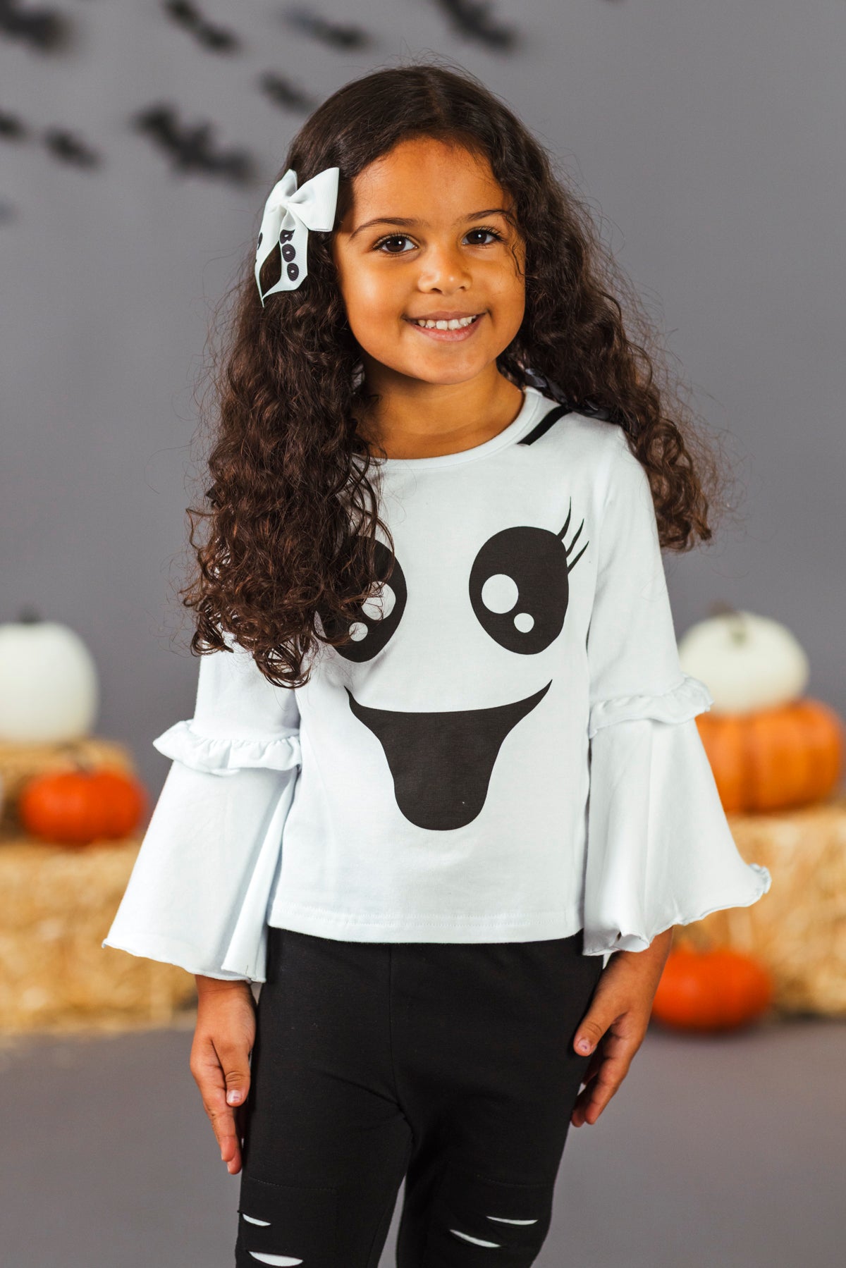 Black & White Ghost Distressed Legging Set - 3XS-6-12 Months - Light blue long-sleeve top with ghost face graphic and bell sleeves paired with black distressed leggings.