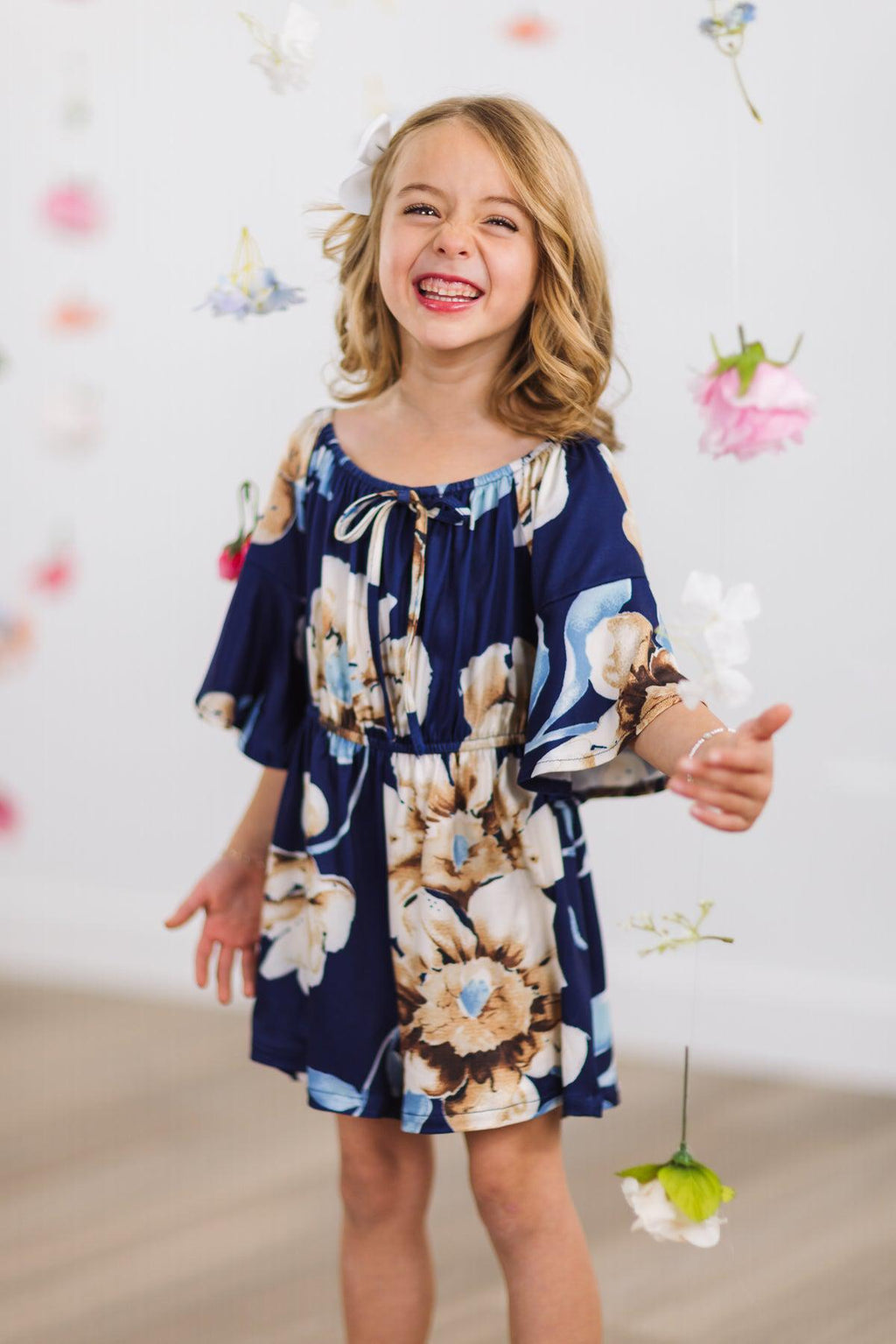 Navy Floral Bell Sleeve Romper | Sparkle in Pink