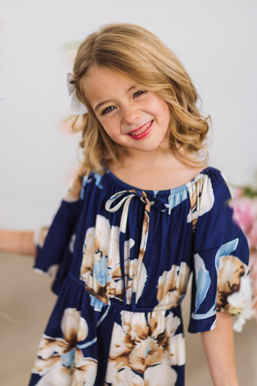 Navy Floral Bell Sleeve Romper | Sparkle in Pink