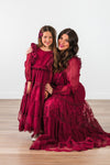 Mom & Me - Burgundy Swiss Dot Dress - CHILD-Small-3T - Burgundy Swiss dot dress with ruffled sleeves and tiered skirt, worn by woman and girl.