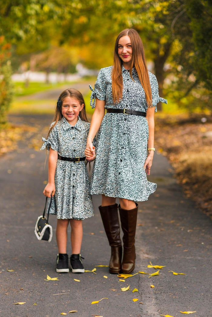 Mom & Me - Leopard Print Dress - CHILD-3XS-6-12 Months - Matching blue floral midi dresses with puff sleeves and ruffled hem, styled with black boots and handbag.