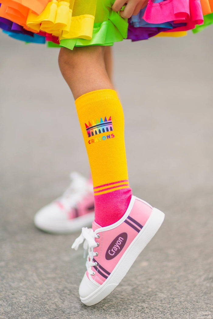 "Crayons" Costume Knee High Socks - Small - Yellow knee-high socks with colorful crayon graphics worn with pink and white sneakers and a bright multicolor tutu skirt.