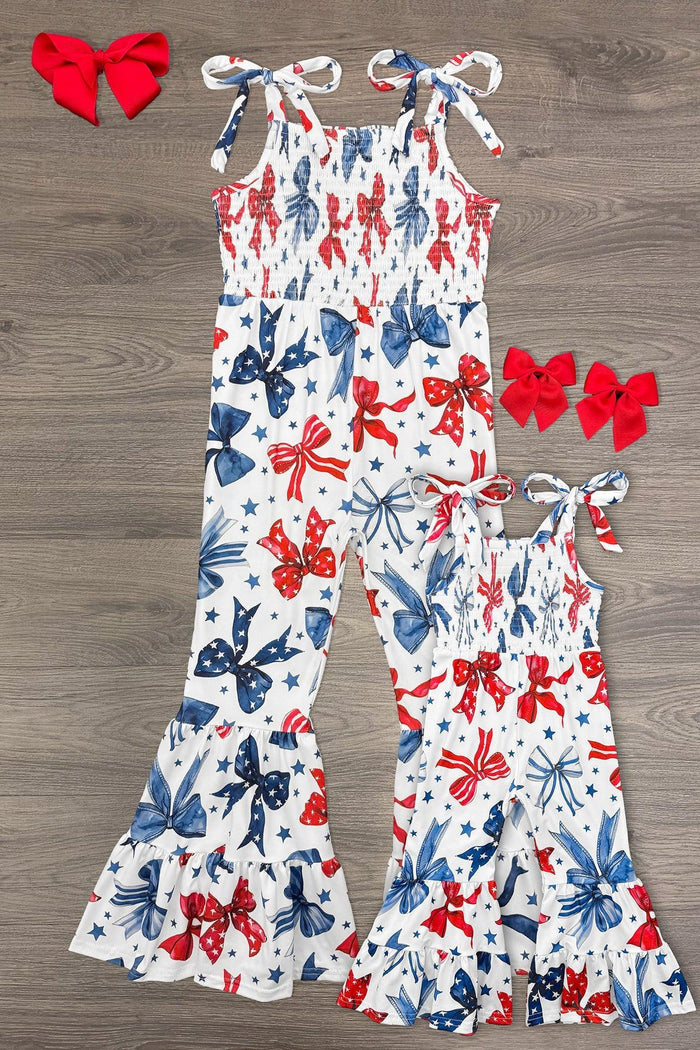 Mom & Me - Red White & Blue Bow Jumpsuit - CHILD-6-12 Months - Red, white, and blue starfish print jumpsuits with ruffled hems and shoulder ties; matching red hair bows.