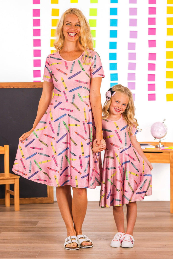 Mom & Me - Pink Glitter Crayon Dress - CHILD-2T - Matching pink dresses with multicolored glitter crayon print, short sleeves, and flared skirts for mom and daughter.