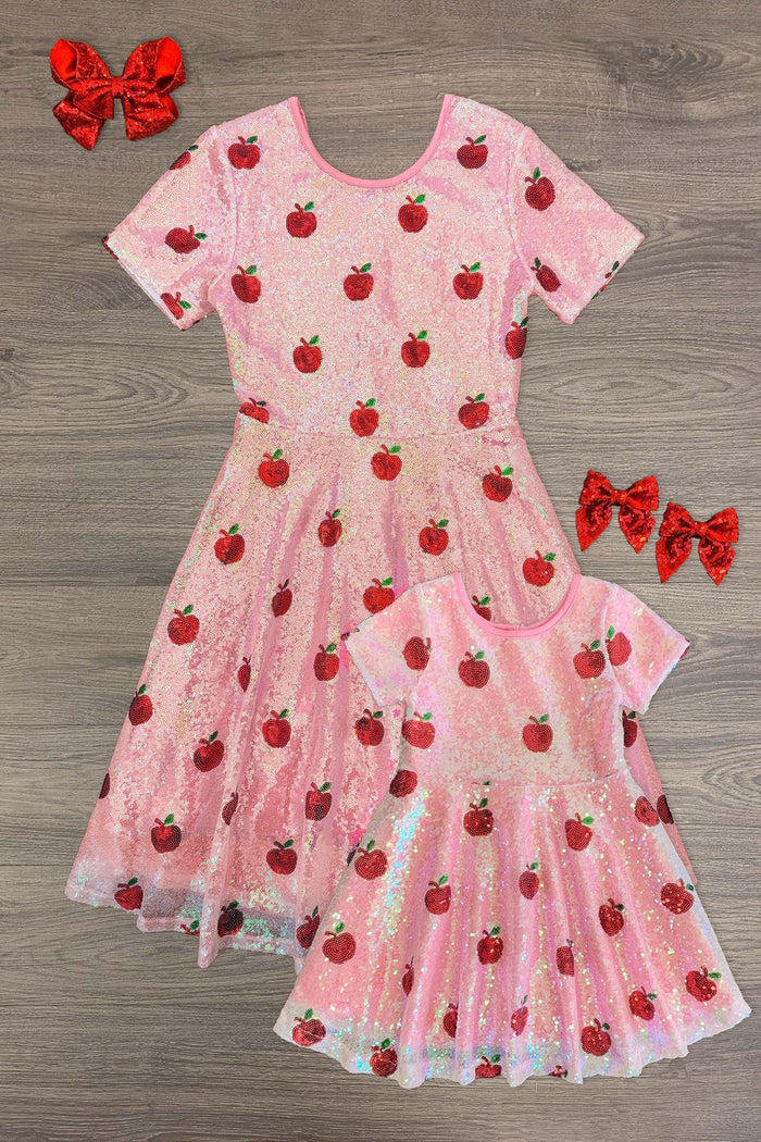 Mom & Me - Pink Sequin Apple Dress - CHILD-2T - Pink sequin dress with red apple pattern, short sleeves, and scalloped edges in adult and child sizes with matching red bows.