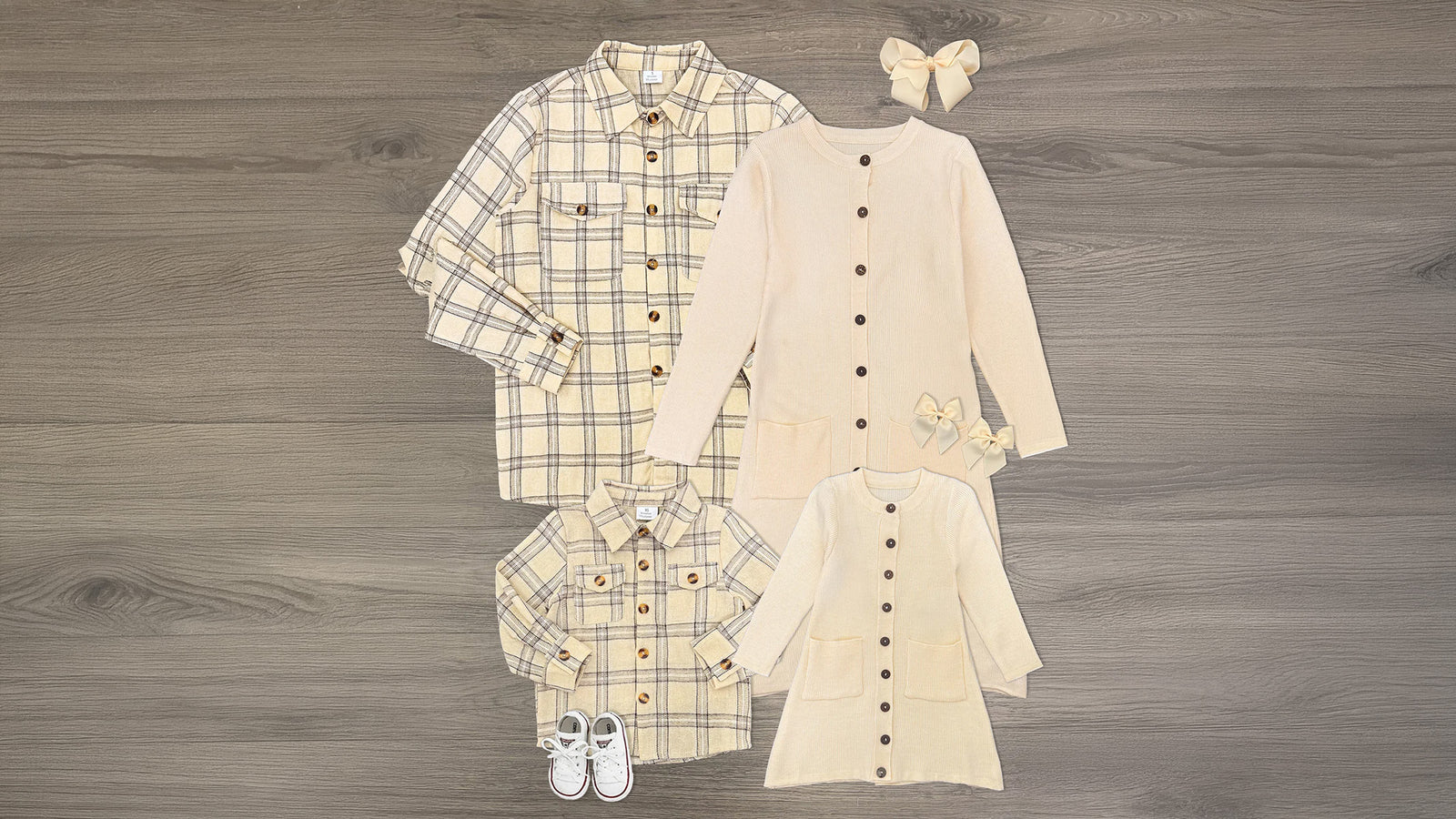 Family matching cool weather outfits with cream sweater dresses for mom and girls and cream plaid button-down flannels for dad and boys