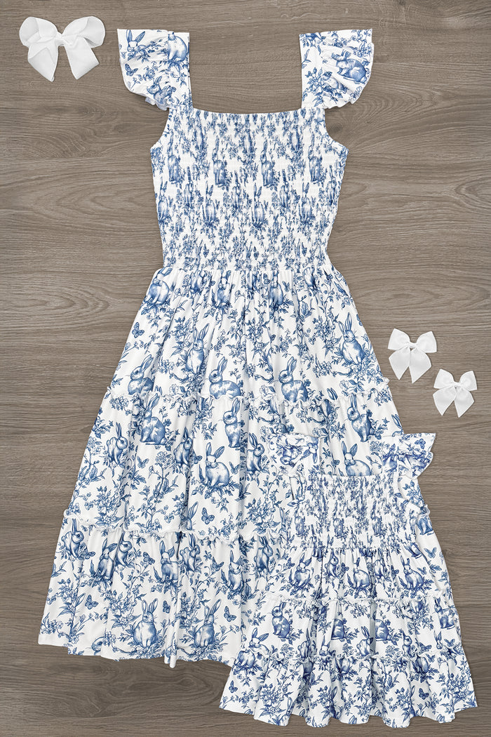 Mom & Me - Floral Bunny Dress - CHILD-6-12 Months - Blue and white floral midi dress with smocked waist and ruffle sleeves.