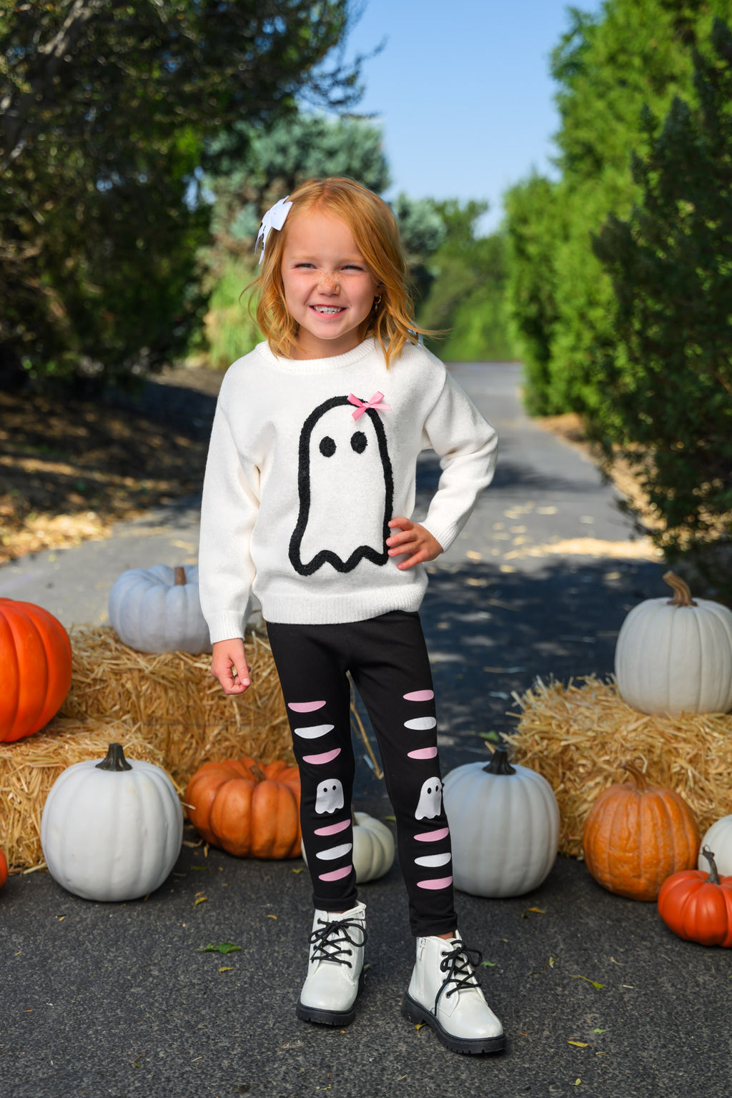 Ghost Pant Set - Boy Or Girl - GIRL-6-12 Months-FAMILY - Cream long-sleeve top with ghost graphic and black leggings featuring ghost cutouts and white sneakers on child outdoors.