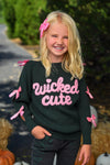 "Wicked Cute" Denim Flare Set - 6-12 Months - Black denim long-sleeve top with pink "wicked cute" lettering and pink bows on sleeves.