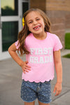 "Pre-K - Sixth Grade" Pink Pearl Denim Short Set - PRE-K / 2T - Pink short-sleeve t-shirt with scalloped hem and "FIRST GRADE" text paired with blue denim shorts featuring white polka dots.