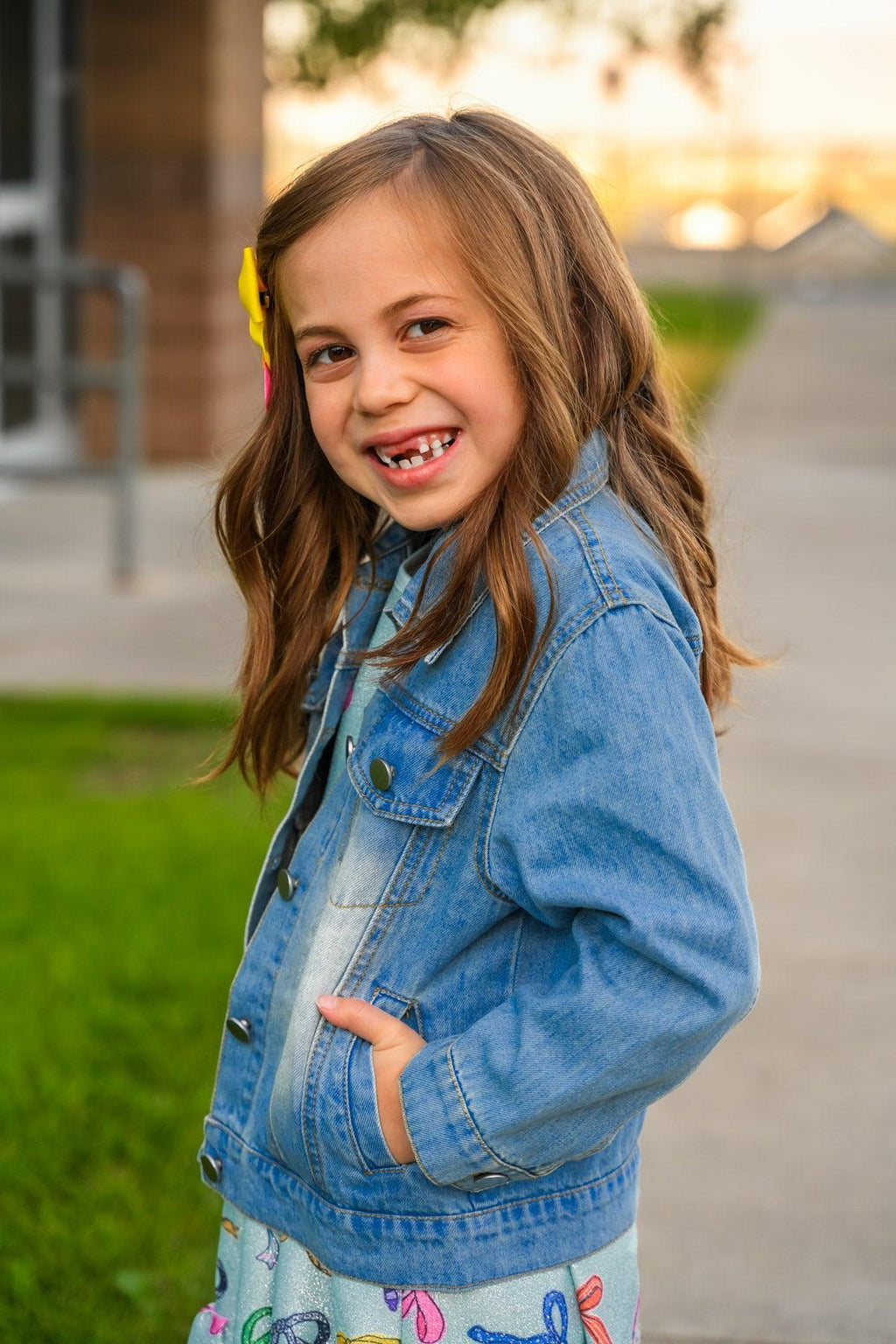 "Preschool - Sixth Grade" Denim Jacket - PRESCHOOL / 3T - Light blue denim jacket with front pockets and button closure, worn by young girl outdoors.
