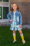 "Preschool - Sixth Grade" Denim Jacket - PRESCHOOL / 3T - Light blue denim jacket with button front and chest pockets, worn over a colorful dress.