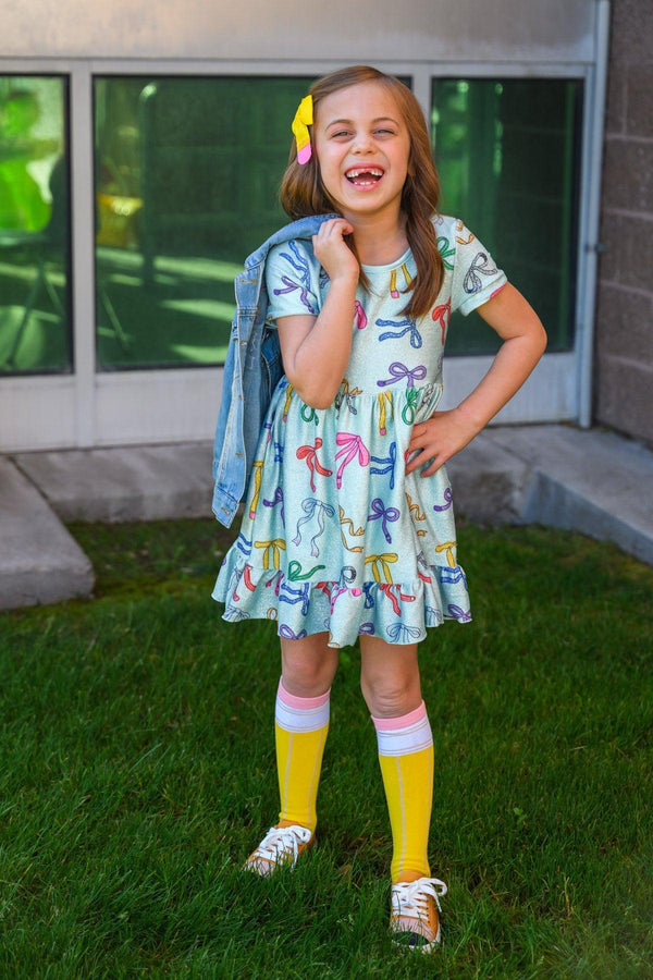 Mint Glitter School Bows Dress - 3T - Mint green dress with colorful school-themed prints, short sleeves, and ruffled hem.