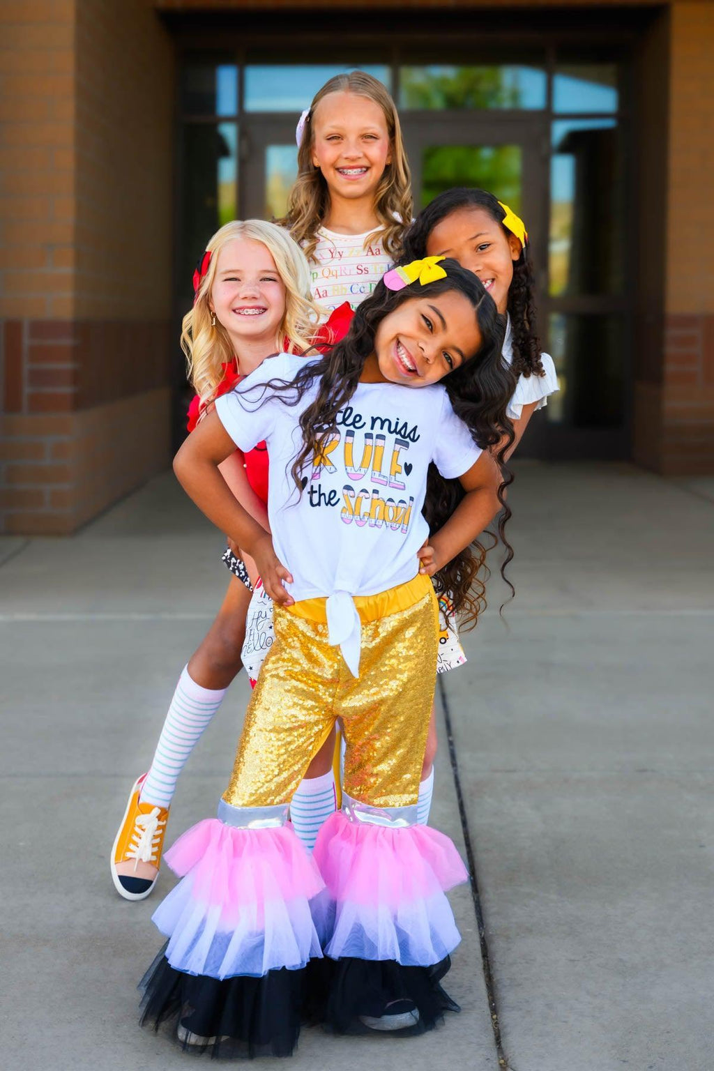 "Little Miss Rule The School" Bell Bottom Set - 3T - White short-sleeve top with "Little Miss Rule The School" text paired with gold bell-bottom pants featuring pink, white, and