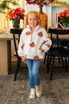 Mom & Me - Pumpkin Sherpa Pullover - CHILD-6-12 Months - Child wearing a cream sherpa pullover with orange pumpkin accents, orange trim, and blue jeans.