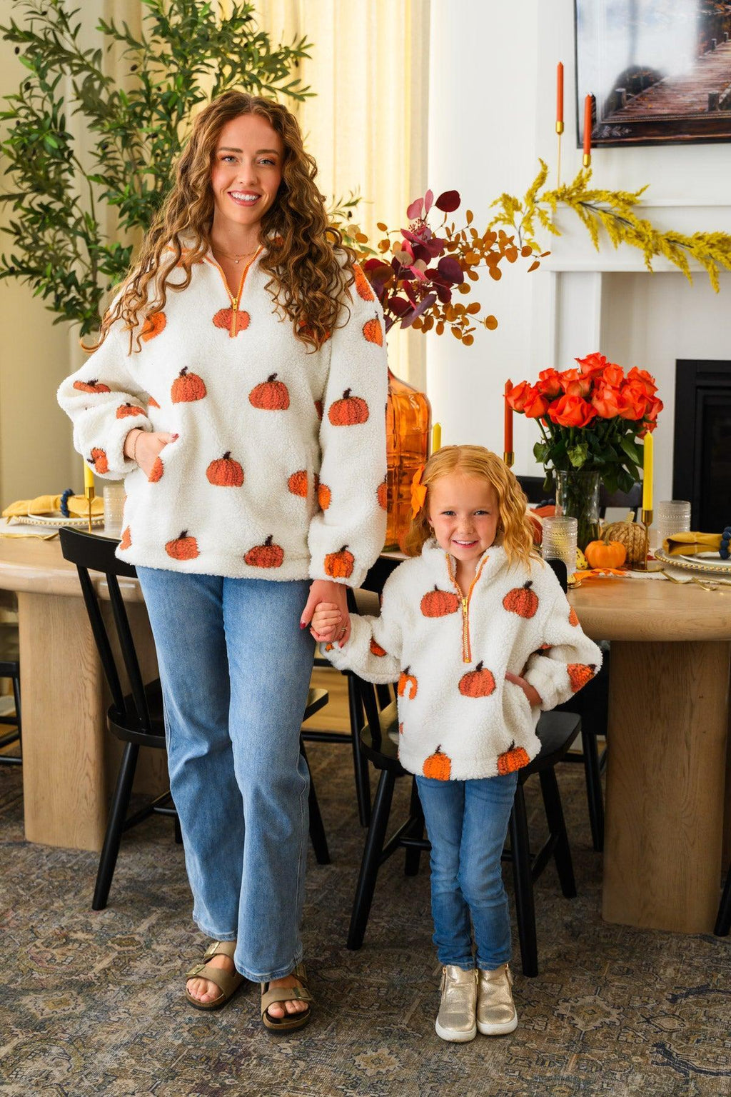 Mom & Me - Pumpkin Sherpa Pullover - CHILD-6-12 Months - Cream sherpa pullovers with orange pumpkin prints, worn by a woman and child in matching outfits.