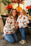 Mom & Me - Pumpkin Sherpa Pullover - CHILD-6-12 Months - Cream sherpa pullovers with orange pumpkin and green leaf patterns worn by a woman and child.