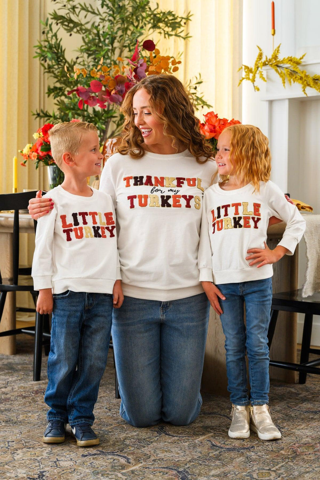 Mom & Kid - "Thankful For My Turkeys & Little Turkey" Top - GIRL-6-12 Months-FAMILY - Cream long-sleeve family tops with red “Thankful for my turkeys” lettering, worn by a mother and two children.