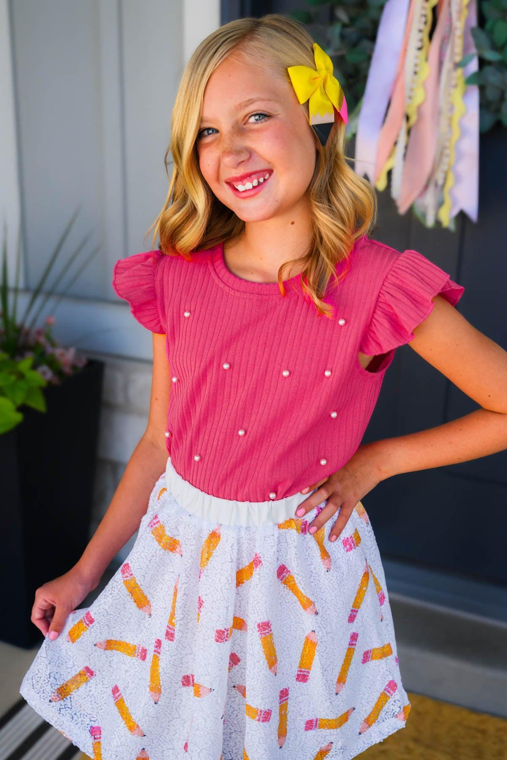 Pink Sequin Pencil Skirt Set - 2T - Pink short-sleeve top with pearl accents and white skirt with colorful pink and orange sequin pencil designs worn by smiling .
