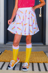 Pink Sequin Pencil Skirt Set - 2T - White skirt with colorful lipstick print, flared style, worn with pink top and yellow knee-high socks.