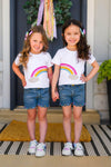 Gemstone Rainbow Denim Short Set - Left Side / 6-12 Months - Girls wearing white t-shirts with rainbow graphic and blue denim shorts with gemstone details.