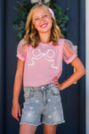 Pink Bow Denim Short Set - 6-12 Months - Pink short-sleeve top with bow graphic and sheer polka-dot puff sleeves paired with distressed denim shorts.
