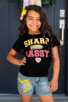 "Sharp & Sassy" Denim Short Set - Small-3T - Black graphic t-shirt with "Sharp & Sassy" text paired with blue denim shorts featuring a yellow and white heart patch.