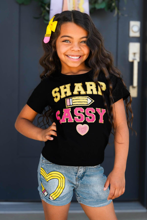 "Sharp & Sassy" Denim Short Set - Small-3T - Black graphic t-shirt with "Sharp & Sassy" text paired with blue denim shorts featuring a yellow and white heart patch.