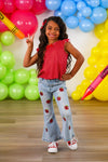 Red Apple Flare Denim Pant Set - 3T - Child wearing light blue flare denim pants decorated with red apple patches paired with a sleeveless red polka-dot top and.
