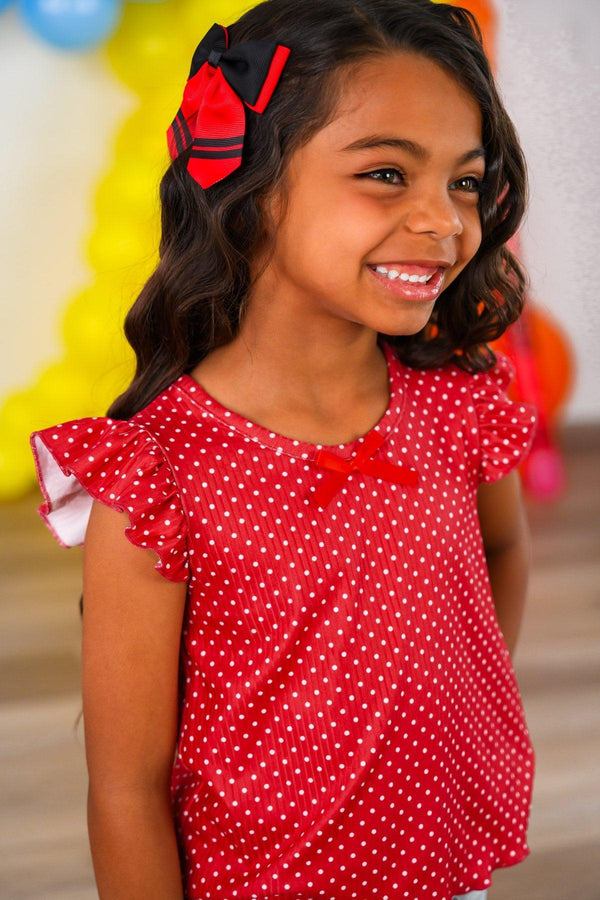 Red Apple Flare Denim Pant Set - 3T - Red short-sleeve top with white polka dots, ruffled sleeves, and a small bow at neckline on a smiling girl.