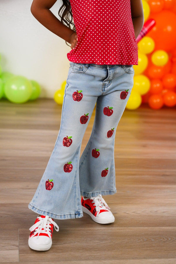 Red Apple Flare Denim Pant Set - 3T - Light blue flare denim pants with red apple patches, worn with red and white sneakers.
