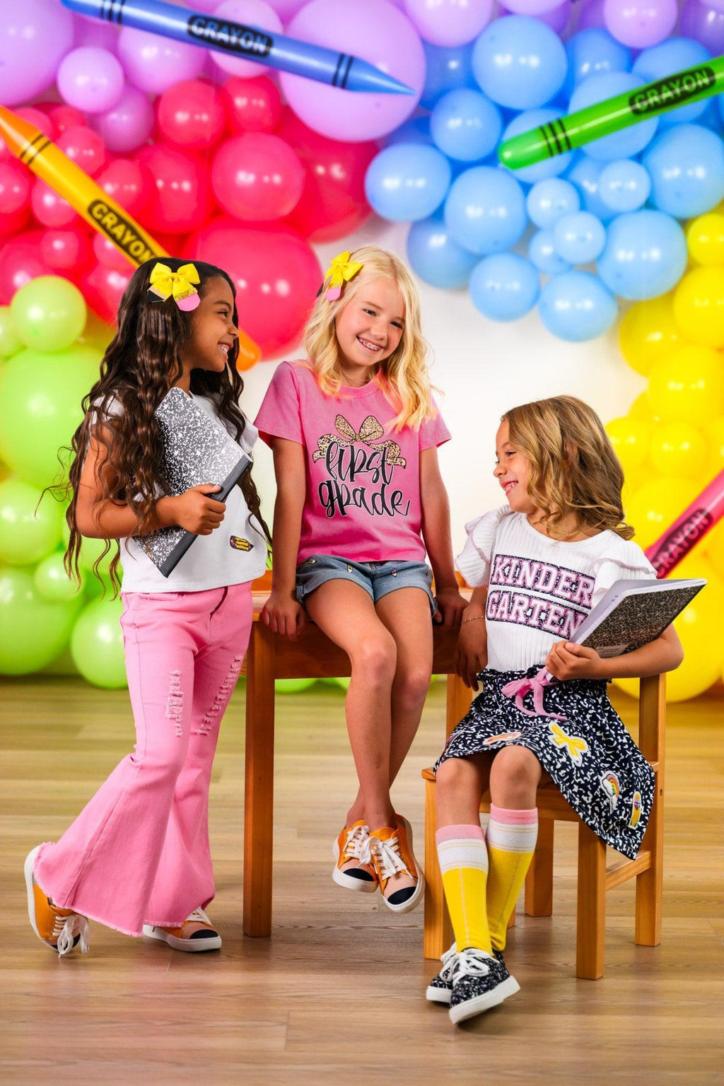 "Pre-K - Sixth Grade" Cheetah Denim Short Set - PRE-K / 2T - Pink flared pants with a pocket paired with a black cheetah print denim jacket and yellow hair bow.