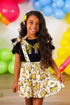 Pencil Bow Suspender Skirt Set - 3T - Yellow pencil-print suspender skirt with bow details paired with a black short-sleeve top.