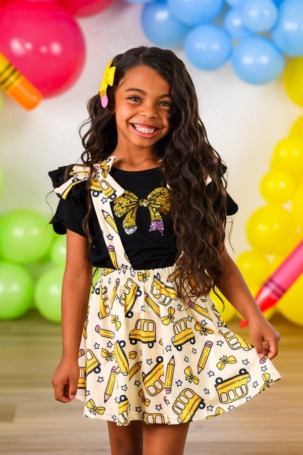 Pencil Bow Suspender Skirt Set - 3T - Yellow pencil-print suspender skirt with bow details paired with a black short-sleeve top.