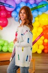Mom & Me - Crayon Cardigan - CHILD-3T - Cream knit cardigan with colorful crayon embroidery, long sleeves, and cozy fit worn by model.