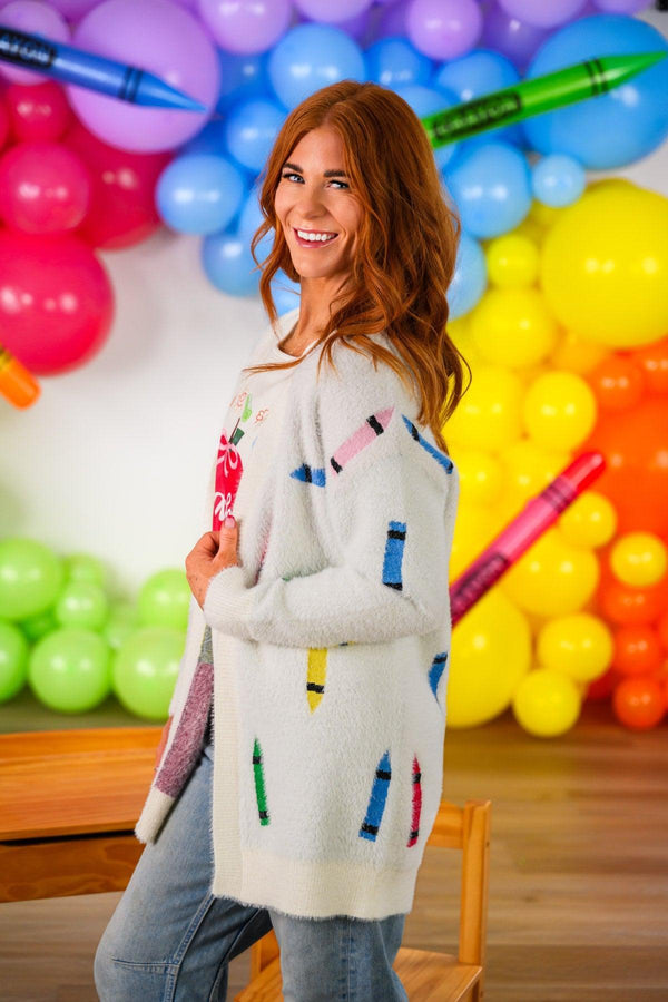 Mom & Me - Crayon Cardigan - CHILD-3T - Cream knit cardigan with colorful crayon embroidery, long sleeves, and cozy fit worn by model.