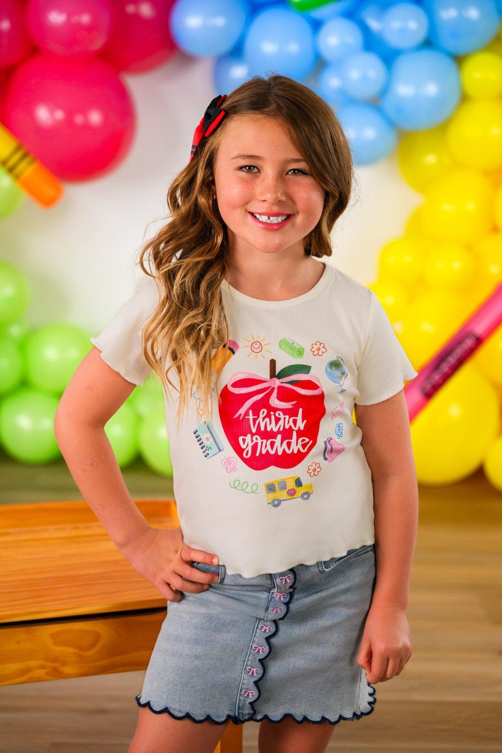 "Pre-K - Fifth Grade" Apple Denim Skirt Set - PRE-K / 2T - Cream short-sleeve shirt with colorful apple graphic paired with light blue denim skirt featuring ruffled hem and scalloped.