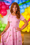 Mom & Me - Pink Pencil & Bow Dress - CHILD-3T - Pink knee-length dress with short sleeves, featuring a playful pencil and bow print pattern.