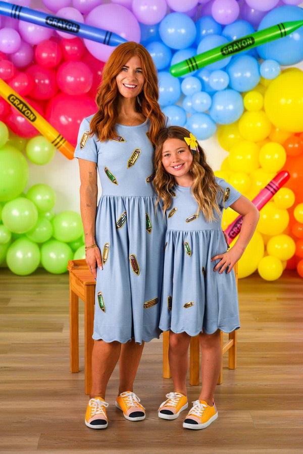 Mom & Me - Blue Pencil Dress - CHILD-3T - Light blue short-sleeve pencil dresses with a relaxed fit and feather print, worn by woman and girl.