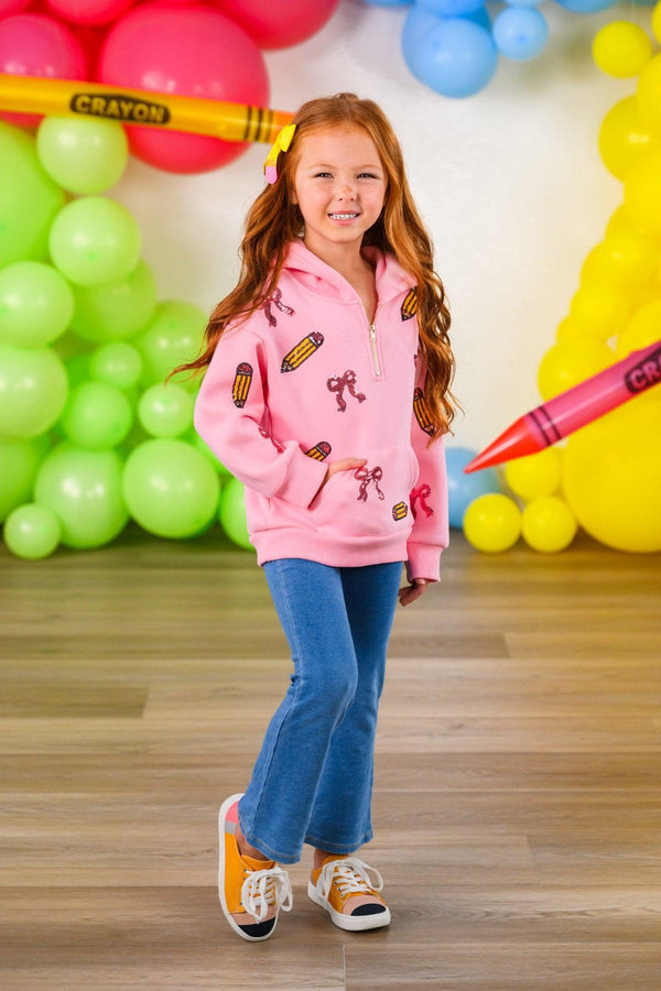 Mom & Me - Pink Pencils & Bows Pullover - 3T - Pink pullover with pencil and bow prints, worn with blue jeans and orange sneakers.