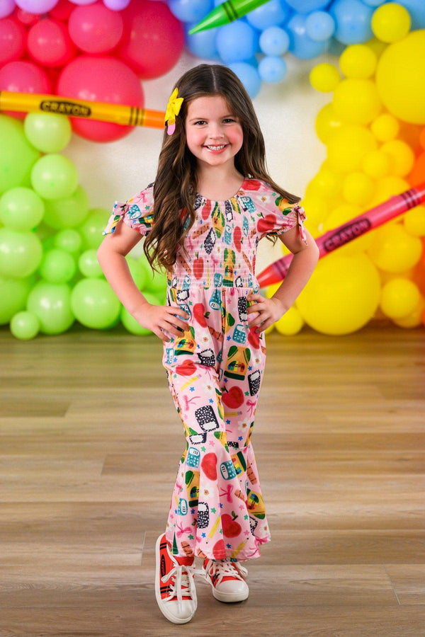 Pink School Supplies Jumpsuit - 3T - Pink jumpsuit with colorful school supply print, short sleeves, and flared legs.