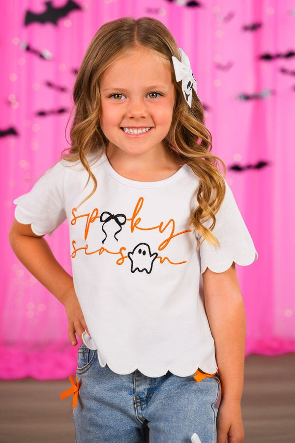 "Spooky Season" Bow Denim Pant Set - 6-12 Months - White short-sleeve shirt with scalloped hem and orange "Spooky Season" text featuring ghost and spider illustrations, paired