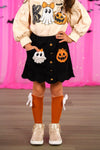 "Boo" Suede Skirt Set - 6-12 Months - Black suede button-front skirt with ghost and pumpkin patches, paired with orange knee-high socks and beige shoes.