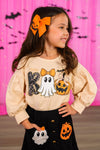 "Boo" Suede Skirt Set - 6-12 Months - Tan suede skirt set with Halloween-themed ghost and pumpkin patches, puffed long sleeves, black skirt with patch details.