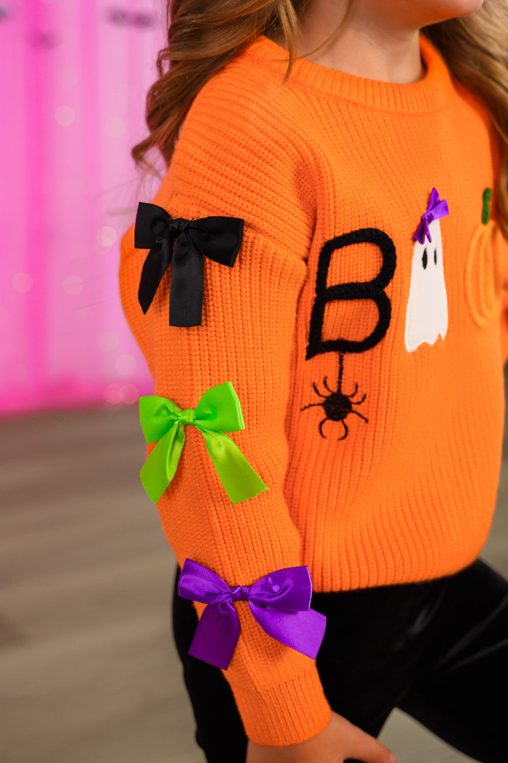 "Boo" Velvet Bell Bottom Set - 6-12 Months - Bright orange velvet sweater with black "Boo" lettering, spider, ghost, and colorful velvet bows on the sleeves.
